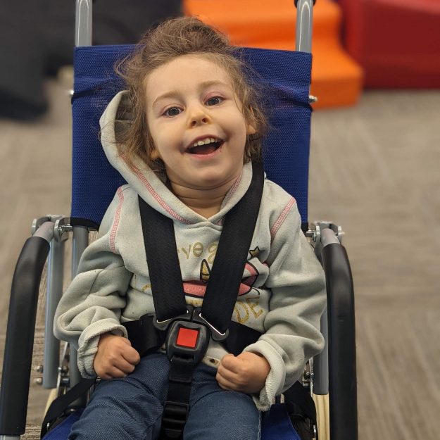 Smiling pediatric therapy patient